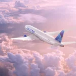 United Airlines WiFi Expands as Starlink Gains FAA Thumbs Up for Mainline Aircraft an airplane flying in the sky. United Airlines WiFi. {Tech} for Travel. https://techfortravel.co.uk