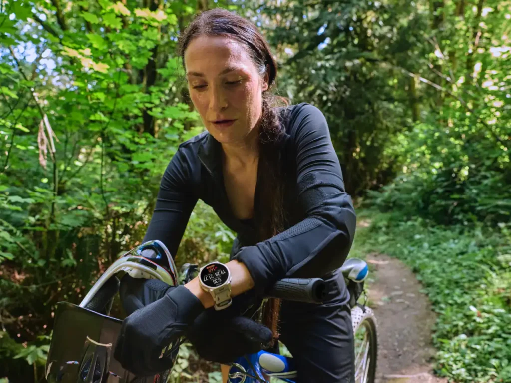 Amazfit T-Rex 3 Pro 44mm lifestyle 1 – {Tech} for Travel a woman on a bicycle in the woods. Amazfit T-Rex 3 Pro 44mm. {Tech} for Travel. https://techfortravel.co.uk