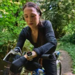 Amazfit T-Rex 3 Pro 44mm lifestyle 1 – {Tech} for Travel a woman on a bicycle in the woods. Amazfit T-Rex 3 Pro 44mm. {Tech} for Travel. https://techfortravel.co.uk