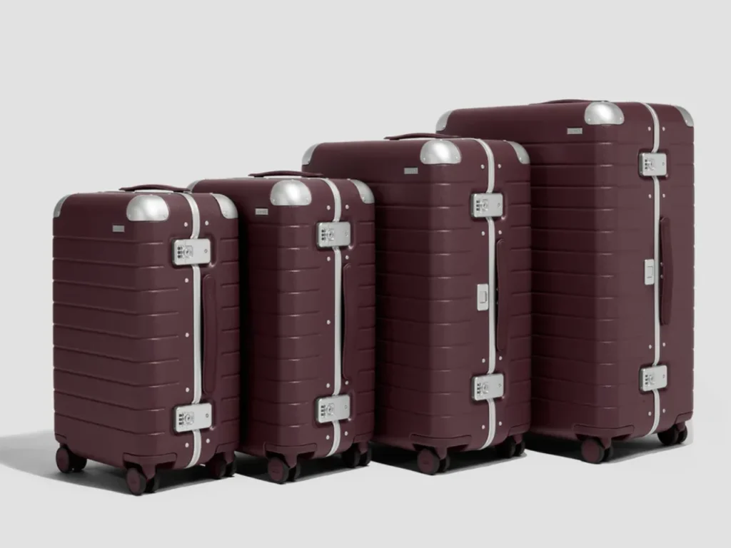 Away Aluminum Edge Collection in Oxblood Red – {Tech} for Travel a group of luggage on wheels. Away Aluminum Edge Collection. {Tech} for Travel. https://techfortravel.co.uk