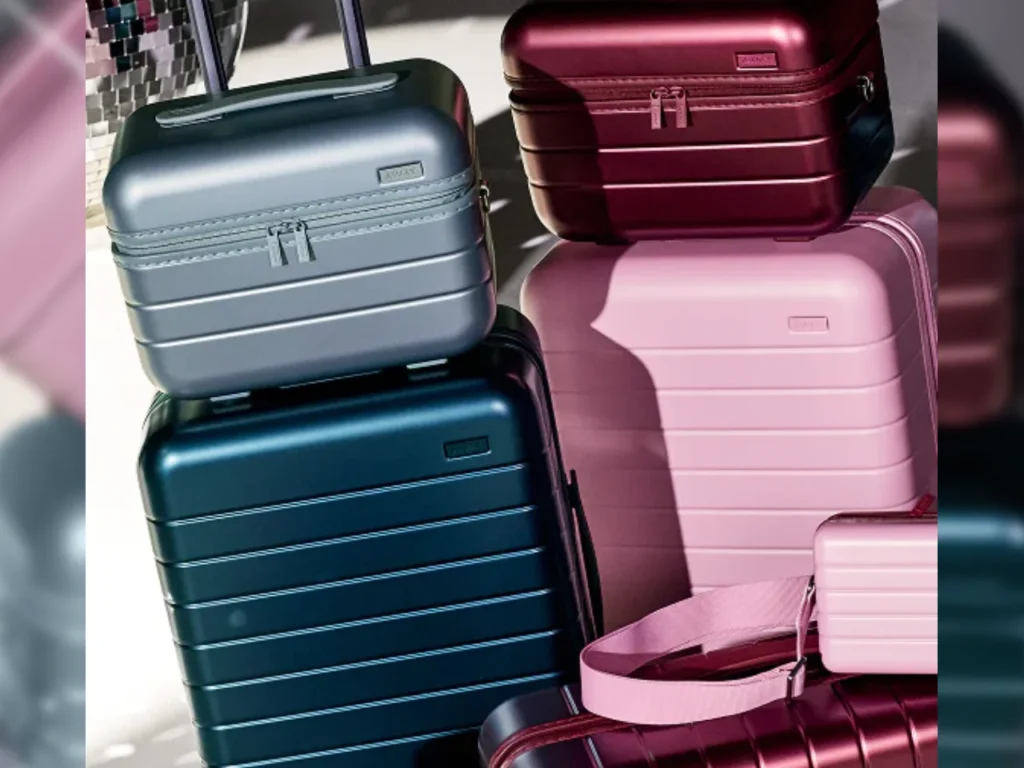 Away Metallic Collection Cases – {Tech} for Travel a stack of luggage with handles. Away Metallic Collection. {Tech} for Travel. https://techfortravel.co.uk