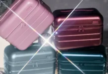 Seasonal Away Metallic Collection Limited Edition goes Festive a stack of luggage with a light shining on it. Away Metallic Collection. {Tech} for Travel. https://techfortravel.co.uk