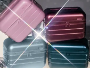 a stack of luggage with a light shining on it. Away Metallic Collection. {Tech} for Travel. https://techfortravel.co.uk
