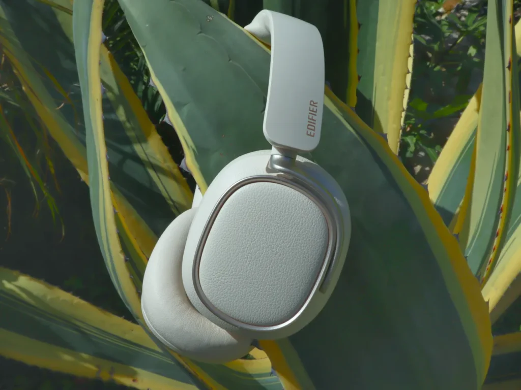 a white headphones on a plant. Edifier ES850NB Headphones Review. {Tech} for Travel. https://techfortravel.co.uk