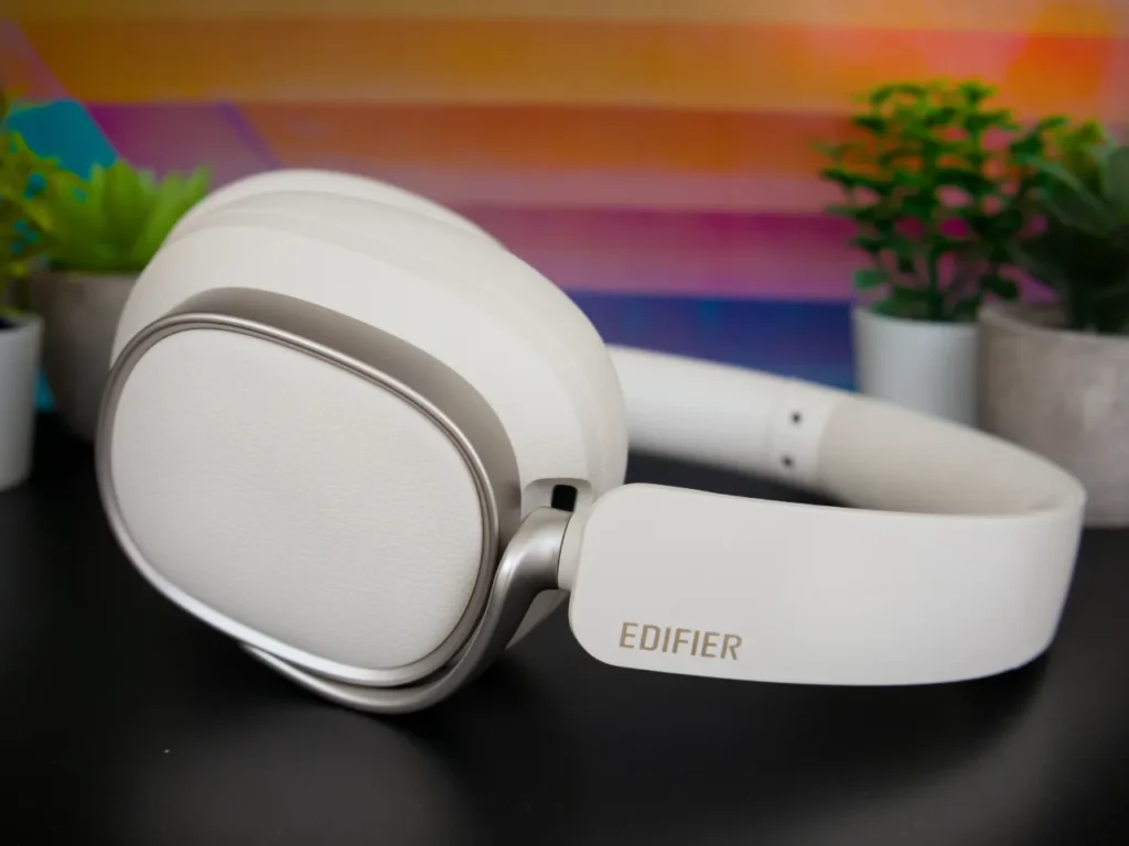 a white headphones on a table. Edifier ES850NB Headphones Review. {Tech} for Travel. https://techfortravel.co.uk