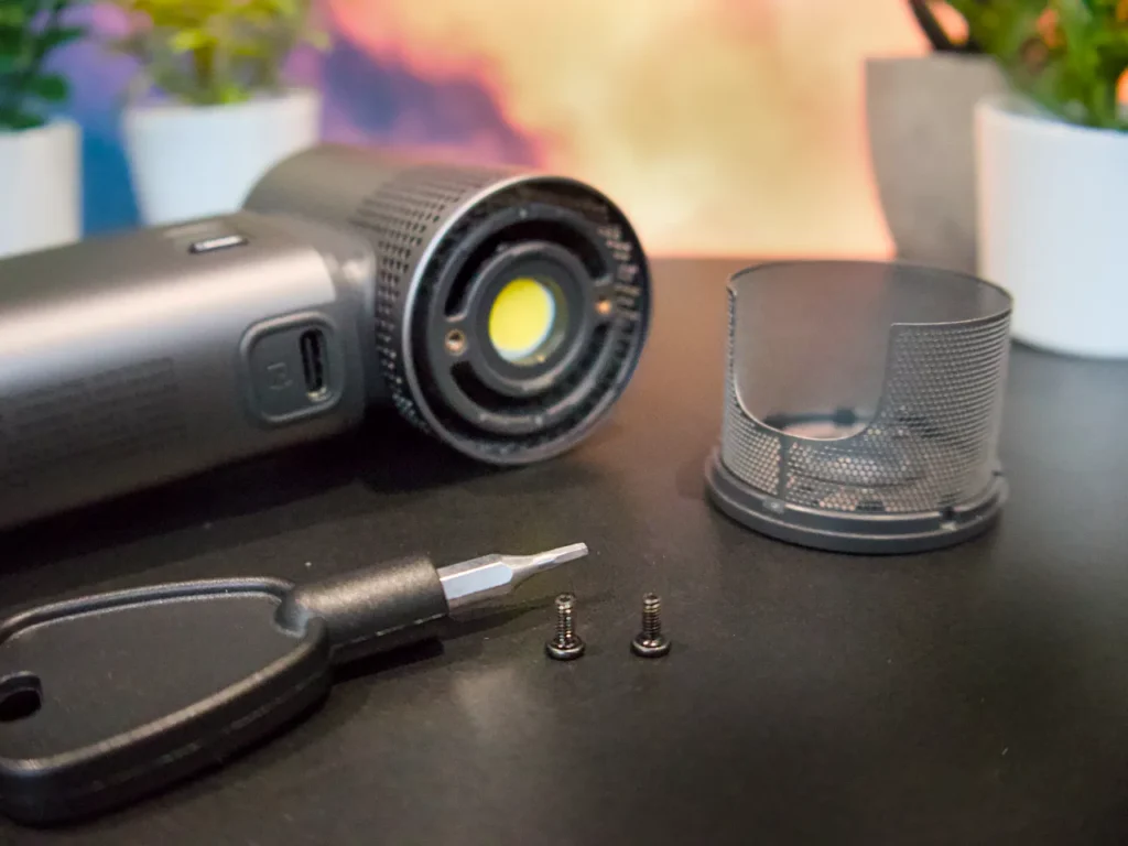 a screwdriver and a screwdriver on a table. Jisulife Ultra2 Portable Fan Review. {Tech} for Travel. https://techfortravel.co.uk