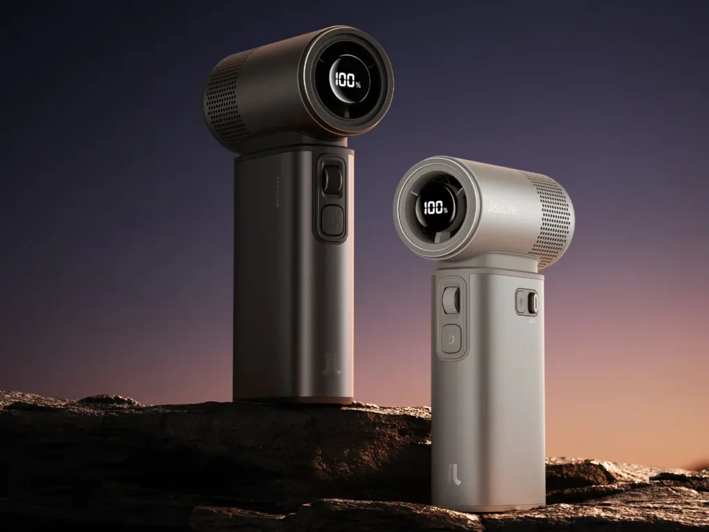 a pair of electronic devices on a rock. Jisulife Ultra2 Portable Fan Review. {Tech} for Travel. https://techfortravel.co.uk