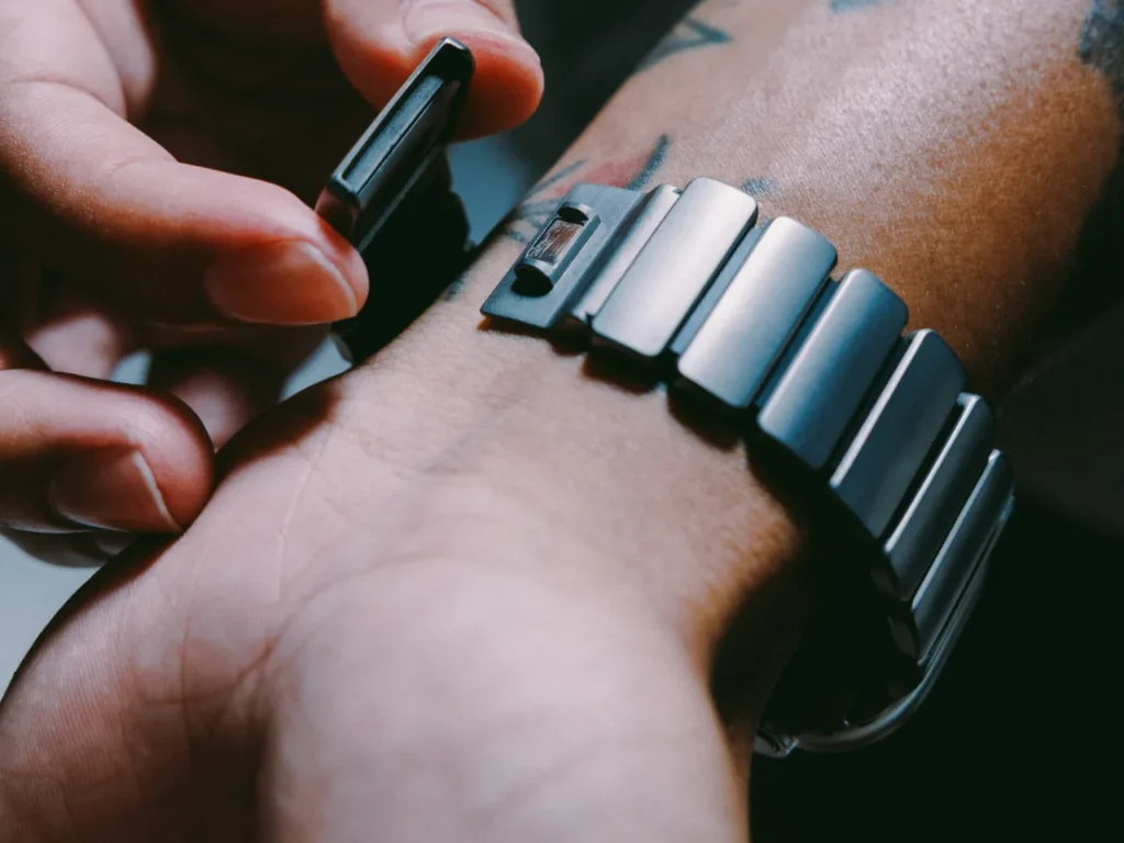 a person using a watch. Nomad Stratos Apple Watch Band. {Tech} for Travel. https://techfortravel.co.uk