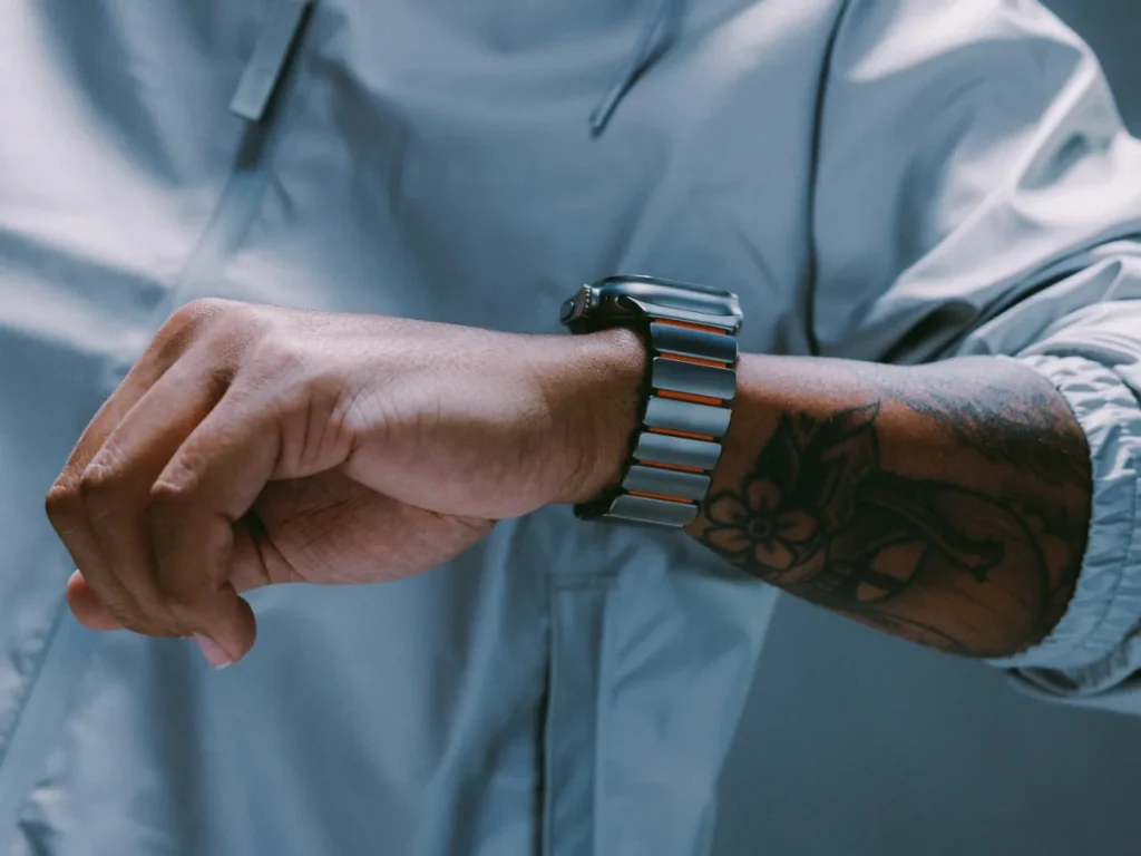 a person wearing a watch. Nomad Stratos Apple Watch Band. {Tech} for Travel. https://techfortravel.co.uk