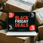 Black Friday and Cyber Monday Round-up – {Tech} for Travel a laptop with a black screen on top of boxes. Black Friday Deals 2025. {Tech} for Travel. https://techfortravel.co.uk