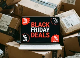 Guide to the best Black Friday travel gadget deals for 2025 a laptop with a black screen on top of boxes. Black Friday Deals 2025. {Tech} for Travel. https://techfortravel.co.uk