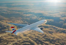British Airways Wi-Fi to Be Free for All with Starlink an airplane flying above clouds. British Airways Wi-Fi. {Tech} for Travel. https://techfortravel.co.uk