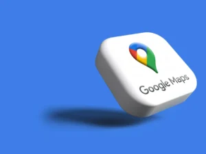 a white square with a logo on it. Google Maps Gemini update. {Tech} for Travel. https://techofrtravel.co.uk