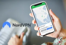 Black Friday Deals 2025: NordVPN Drops Prices by Up to 77% on 2-Year Plans a hand holding a phone. NordVPN Black Friday 2025. {Tech} for Travel. https://techfortravel.co.uk