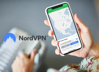 Black Friday Deals 2025: NordVPN Drops Prices by Up to 77% on 2-Year Plans a hand holding a phone. NordVPN Black Friday 2025. {Tech} for Travel. https://techfortravel.co.uk