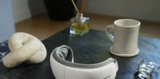 Black Friday Deals 2025: Travel-Friendly Self-Care Tech by RENPHO a white headphones on a table. Black Friday Deals 2025