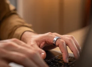 Wearable upgrade Aivela Ring Pro launches with 8 touch and 6 air gestures a person using a laptop. Aivela Ring Pro. CES 2026. {Tech} for Travel. https://techfortravel.co.uk