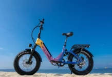 Long-range ebike upgrade Heybike X Series confirms 90-mile range a purple and yellow bike on a beach. Heybike X Series. CES 2026 News. {Tech} for Travel. https://techfortravel.co.uk