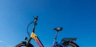Long-range ebike upgrade Heybike X Series confirms 90-mile range a purple and yellow bike on a beach. Heybike X Series. CES 2026 News. {Tech} for Travel. https://techfortravel.co.uk