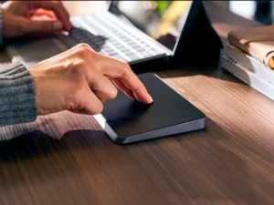 Hyper TrackPad Pro CES 2026 โ {Tech} for Travel a person using a touch screen device. CES 2026 News. Hyper and Targus. {Tech} for Travel. https://techfortravel.co.uk