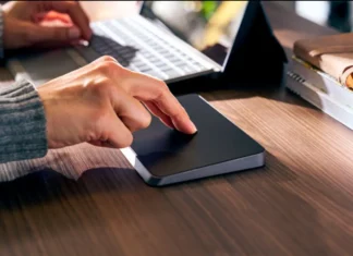 Wave of new Hyper and Targus launches hit CES 2026 a person using a touch screen device. CES 2026 News. Hyper and Targus. {Tech} for Travel. https://techfortravel.co.uk