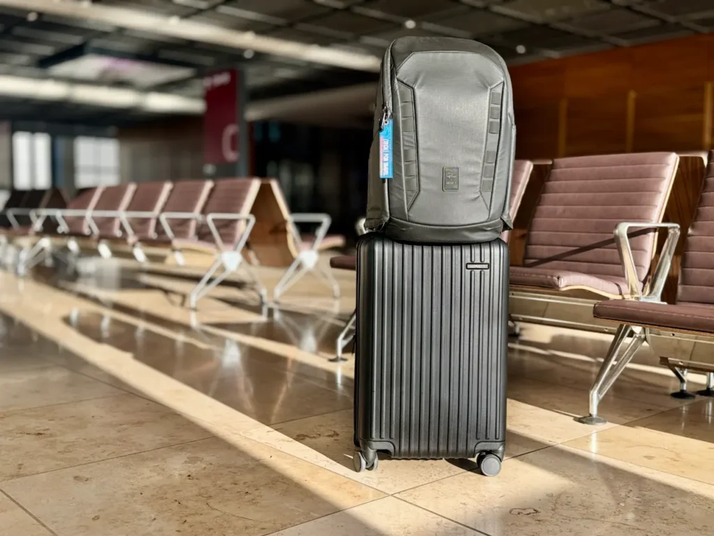 a black luggage on top of a luggage case