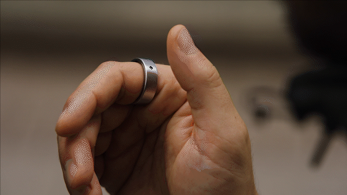 a person holding a ring. Aivela Ring Pro. CES 2026. {Tech} for Travel. https://techfortravel.co.uk