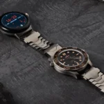 a couple of watches on a table