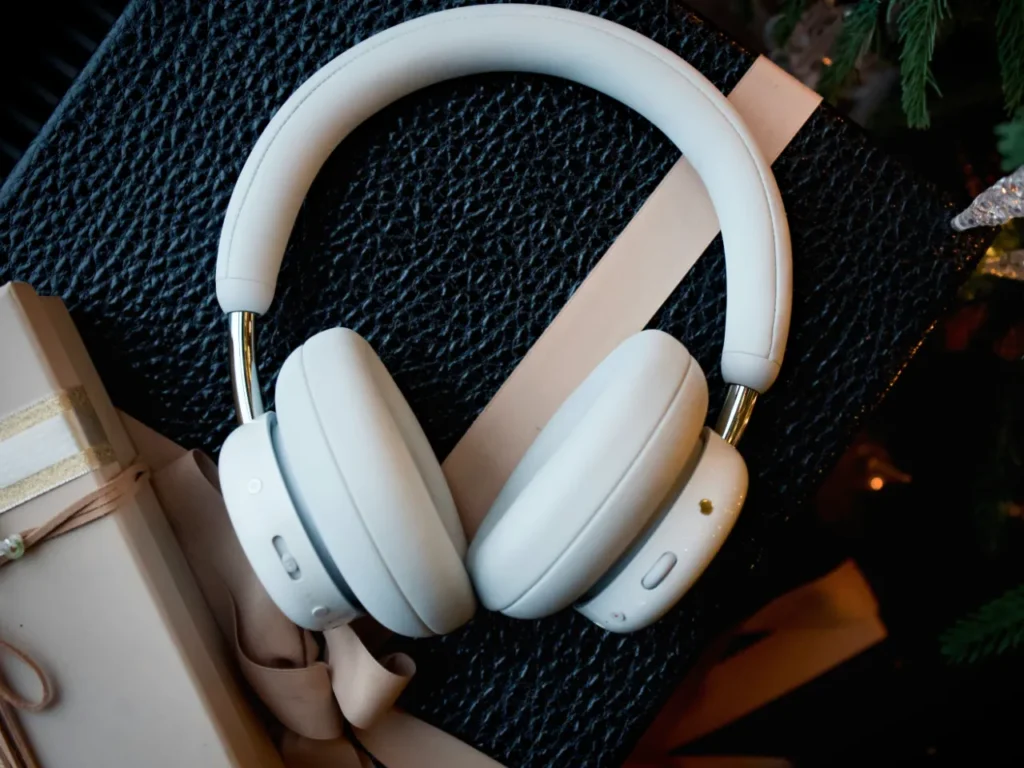 Unsplash Headphones – {Tech} for Travel a white headphones on a black box