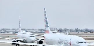 American Airlines Wi-Fi rolling out across entire fleet two airplanes on the runway. American Airlines Wi-Fi. {Tech} for Travel. https://techfortravel.co.uk
