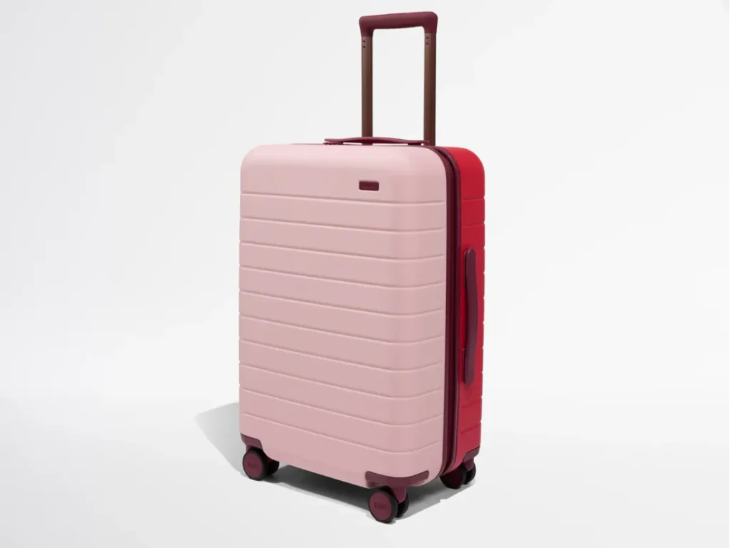 a pink and red suitcase. Away Limited Edition Bigger Carry-on. {Tech} for Travel. https://techfortravel.co.uk