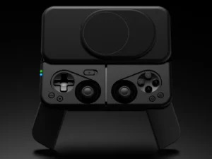 Ohsnap MCON Controller โ {Tech} for Travel a black gaming controller with a round button. Ohsnap MCON Controller. {Tech} for Travel. https://techfortravel.co.uk