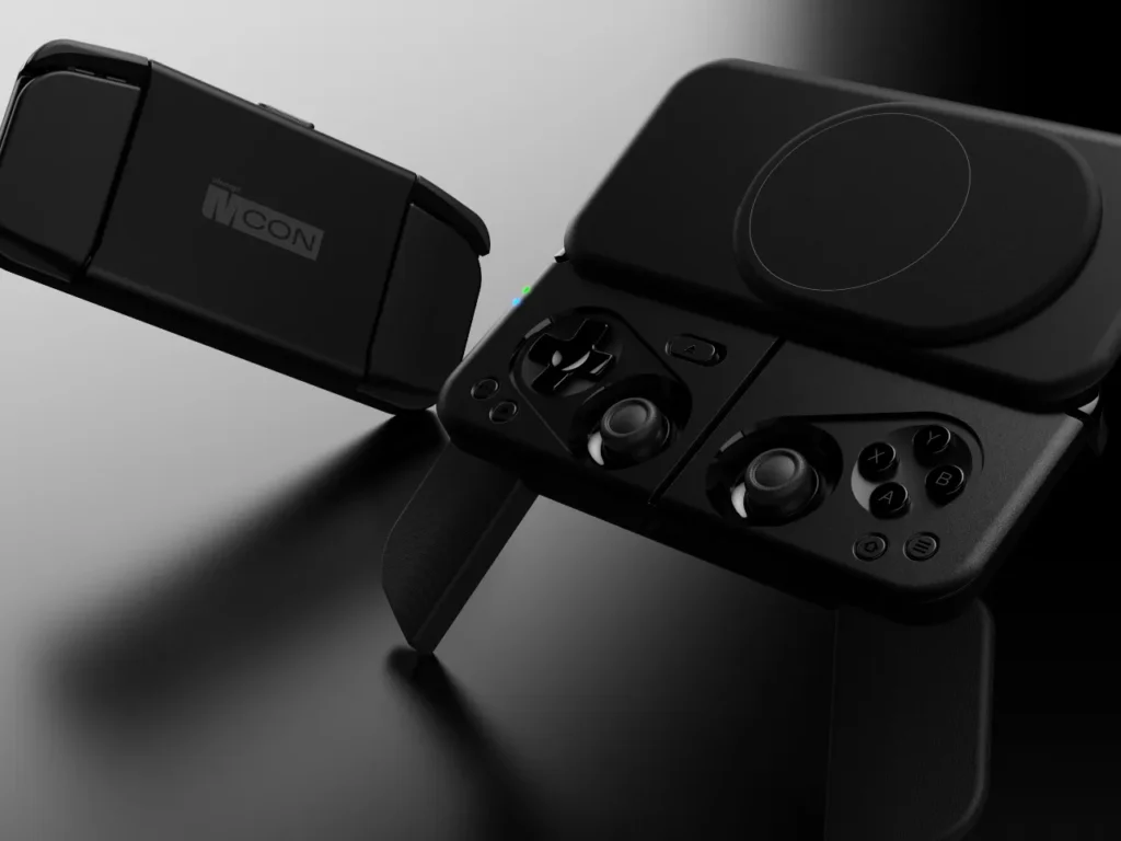 Ohsnap MCON Controller profile – {Tech} for Travel a black gaming device with a black case. Ohsnap MCON Controller. {Tech} for Travel. https://techfortravel.co.uk