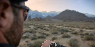 Amazfit T-Rex Ultra 2 gets preloaded maps and a night-vision goggle mode a man looking at his watch. Amazfit T-Rex Ultra 2. {Tech} for Travel. https://techfortravel.co.uk