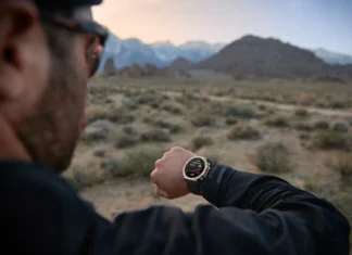 Amazfit T-Rex Ultra 2 gets preloaded maps and a night-vision goggle mode a man looking at his watch. Amazfit T-Rex Ultra 2. {Tech} for Travel. https://techfortravel.co.uk
