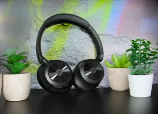 OneOdio Focus A1 Pro Review: Hybrid ANC on a Budget a pair of black headphones on a black surface. OneOdio Focus A1 Pro Review. {Tech} for Travel. https://techfortravel.co.uk