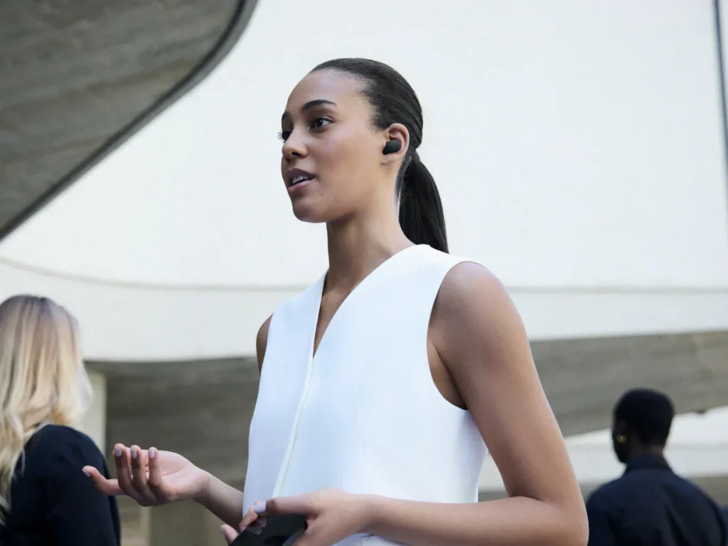 a woman in a white dress. Sony WF-1000XM6 Earbuds. {Tech} for Travel. https://techfortravel.co.uk