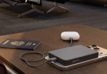 Twelve South PowerCapsule supports Qi2 and USB C charging a device on a table. Twelve South PowerCapsule. {Tech} for Travel. https://techfortravel.co.uk