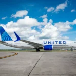 a plane on the runway. United Airlines Starlink Wi-Fi. {Tech} for Travel. https://techfortravel.co.uk