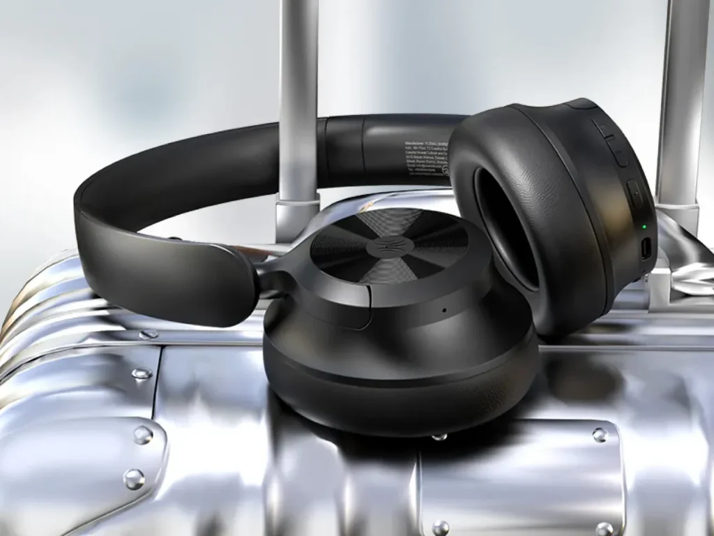 a black headphones on a metal surface. OneOdio Focus A1 Pro Review. {Tech} for Travel. https://techfortravel.co.uk